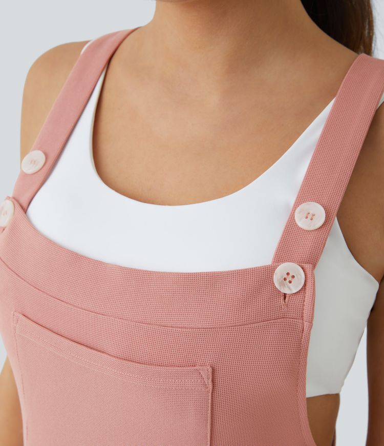 Jogger jumpsuit with adjustable belt and buttons, multiple pockets, and waffle pattern