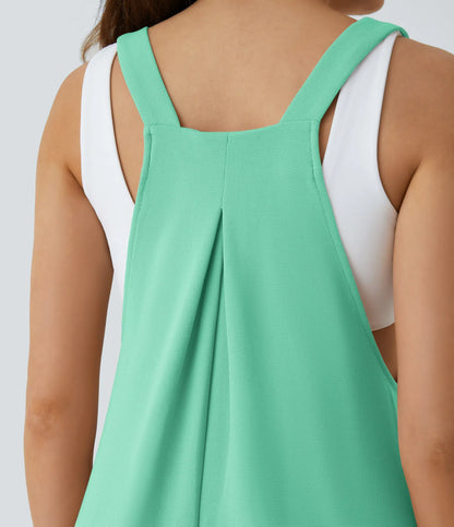 Jogger jumpsuit with adjustable belt and buttons, multiple pockets, and waffle pattern