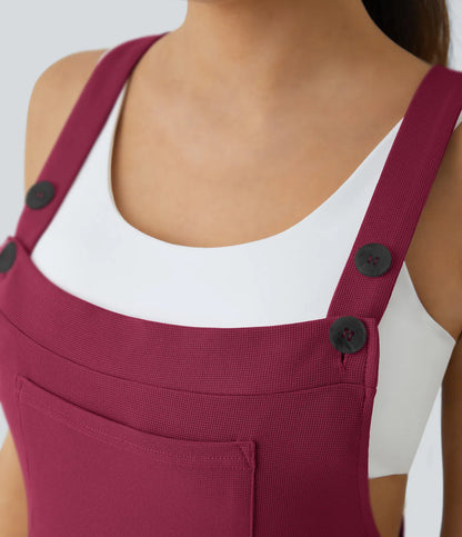 Jogger jumpsuit with adjustable belt and buttons, multiple pockets, and waffle pattern